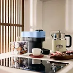 Ξενοδοχείο με διαμερίσματα Syroc Maison